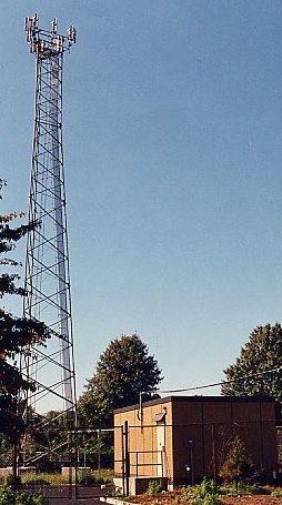 Cell Site Lease rates picture of a lattice cell tower. Tower Genius 888-313-9750