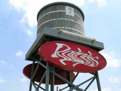 Concealed Water Tower Cell Site in Chino Hills, California. Signage blended for legal reasons.